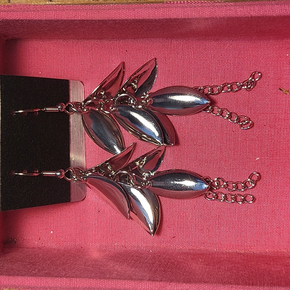 Silver earrings with leaves.